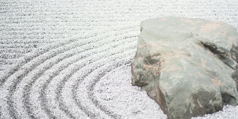 Rock and lines in sand